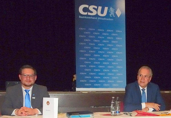 Werner Stieglitz und Joachim Herrmann auf einer Sitzung des Bezirksverbands Mittelfranken im Dezember 2021